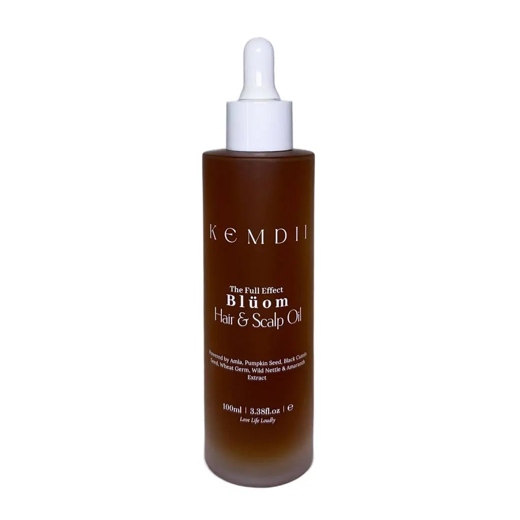 KEMDII Blüom Hair & Scalp Oil bottle on a white background, formulated with rosemary for edges and dry scalp