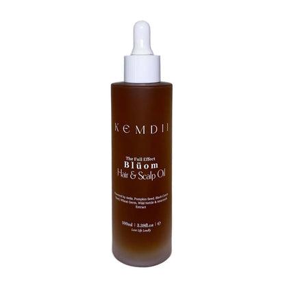 KEMDII Blüom Hair & Scalp Oil bottle on a white background, formulated with rosemary for edges and dry scalp